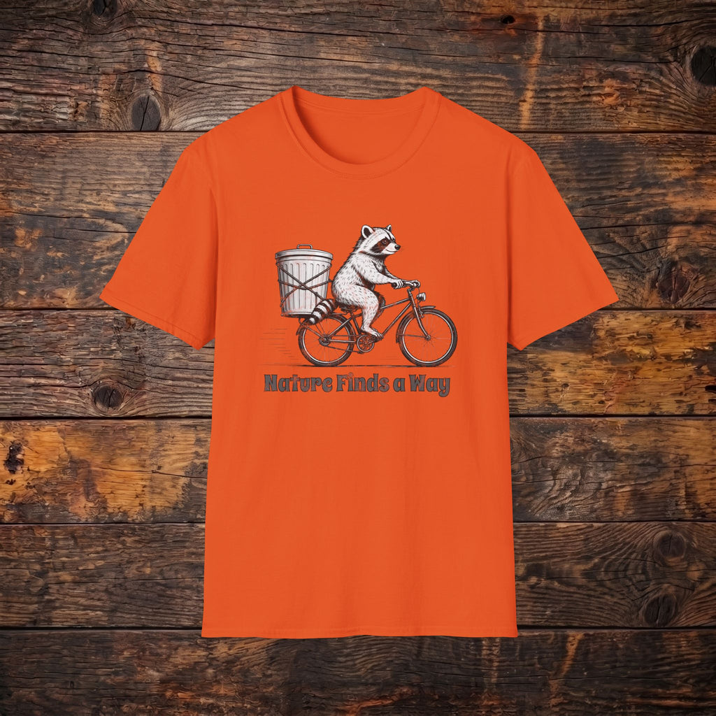 Raccoon on Bike T-Shirt — 'Nature Finds a Way' Graphic Tee