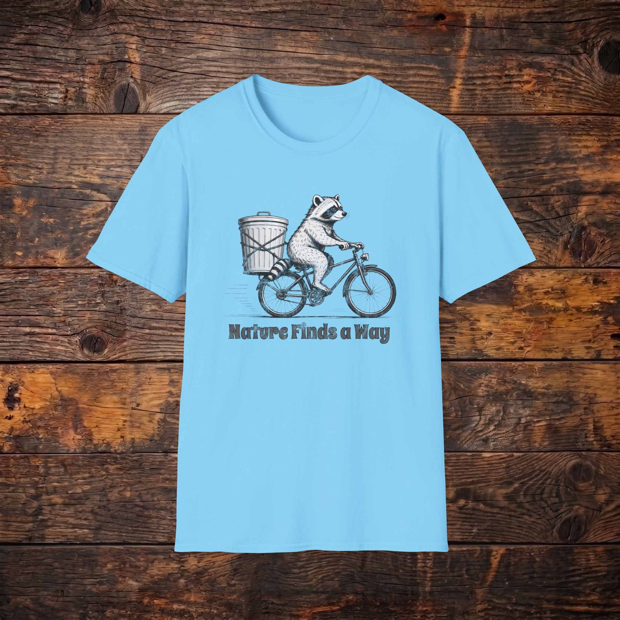 Raccoon on Bike T-Shirt — 'Nature Finds a Way' Graphic Tee